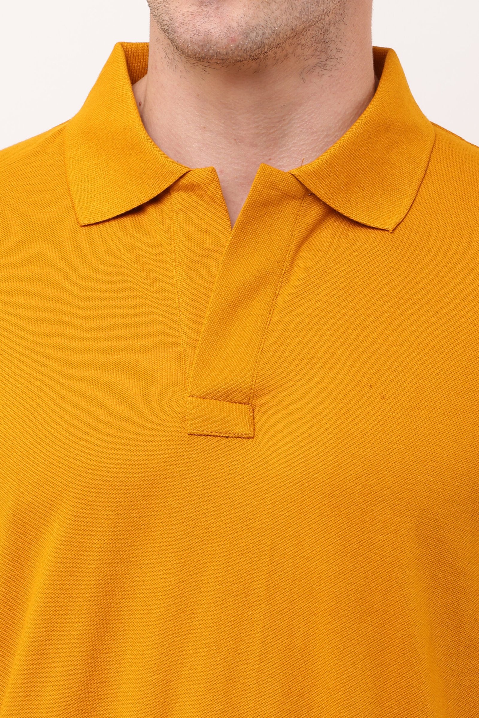 Men Yellow Solid Polo Neck T-shirt